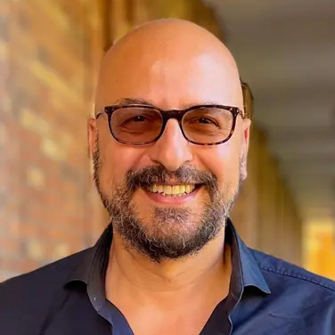 Mehran Meshabi, Executive Director